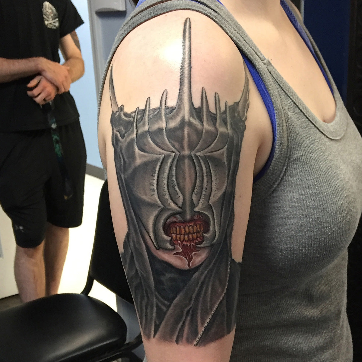 color tattoo of the mouth of sauron character from the lord of rings