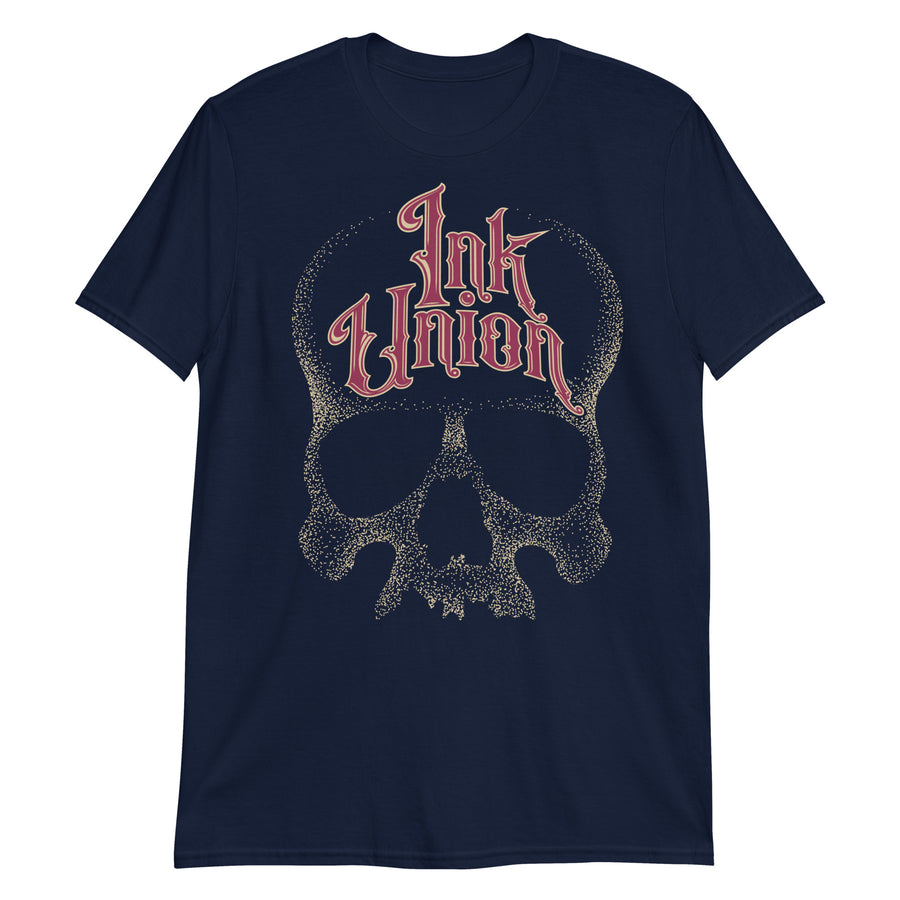 A navy blue t-shirt adorned with a gold dot work human skull  and the words Ink Union in fancy gold and red lettering across the forehead of the skull.