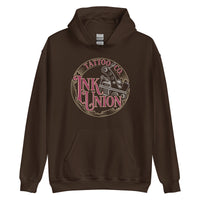 A dark brown hoodie adorned with the Ink Union Tattoo Co. red and gold with a silver tattoo machine logo.