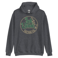 A dark grey hoodie with a gold circle containing fancy lettering in green and gold that says Ink Union and a gold tattoo machine peeking out from behind on the right side.  There is a dot work gradient inside the circle, and the words Tattoo Co. in gold are at the bottom of the design.