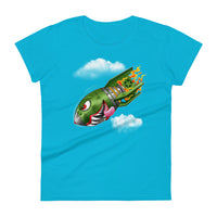 A sky blue t-shirt with a military green neo-traditional bomb tattoo design. The bomb is falling with a look of determination in its eyes, an evil toothy grin, and its tongue hanging out of its mouth. Flames are coming from the back of the bomb, and some clouds are in the background.
