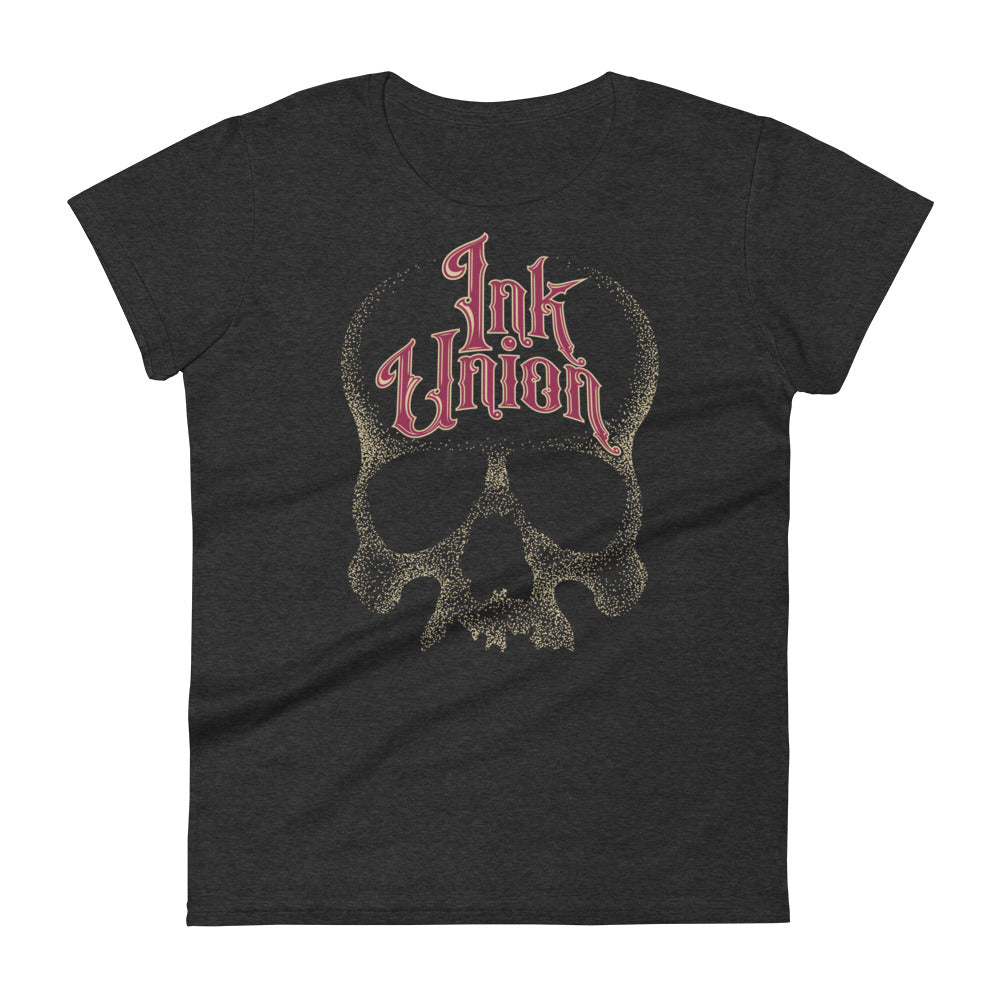A dark grey t-shirt with a gold dot work human skull and the words Ink Union in fancy gold and red lettering across the forehead of the skull.