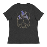 A dark grey t-shirt  featuring a large dot work gold skull centered on the shirt and Ink Union in large fancy gold and blue script across the forehead of the skull