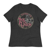 A dark grey t-shirt adorned with the Ink Union Tattoo Co. red and gold with a silver tattoo machine logo.