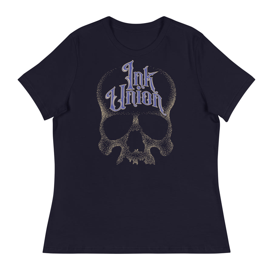A navy blue t-shirt  featuring a large dot work gold skull centered on the shirt and Ink Union in large fancy gold and blue script across the forehead of the skull