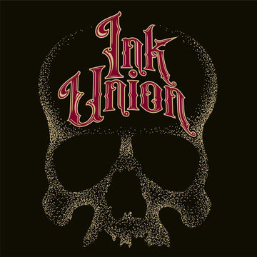 Ink Union Clothing Co. design with black background  featuring a large dot work gold skull centered on the shirt and Ink Union in large fancy gold and red script across the forehead of the skull