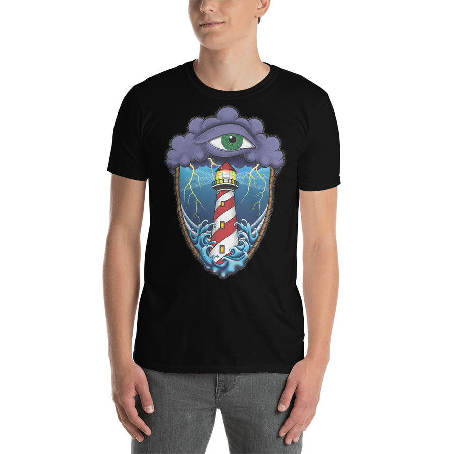 man wearing an Ink Union Clothing Co. black T-shirt based on a classic eye of the storm tattoo.  A green eye in a purple cloud with lightning striking at a light house engulfed in a stormy sea