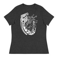 A dark grey t-shirt with a white grenade of sold color and line work morphing into an anatomical heart drawn using line work for shading at the top right of the image.