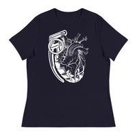 A navy blue t-shirt with a white grenade of sold color and line work morphing into an anatomical heart drawn using line work for shading at the top right of the image.